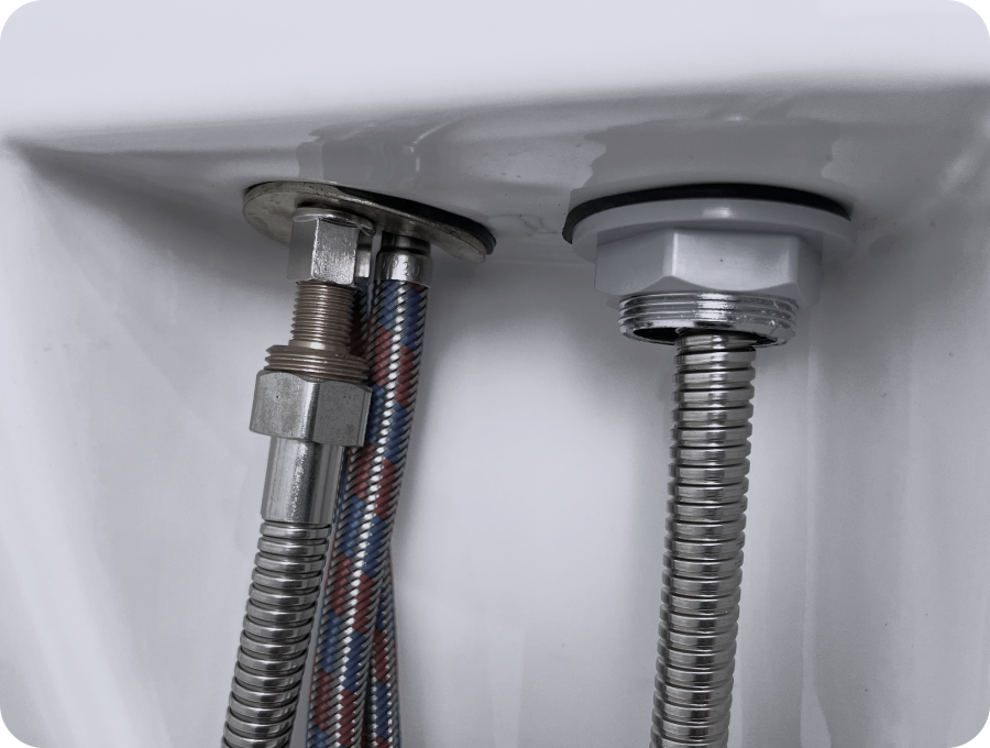 Close up of a dark wooden chair with black metal legs.